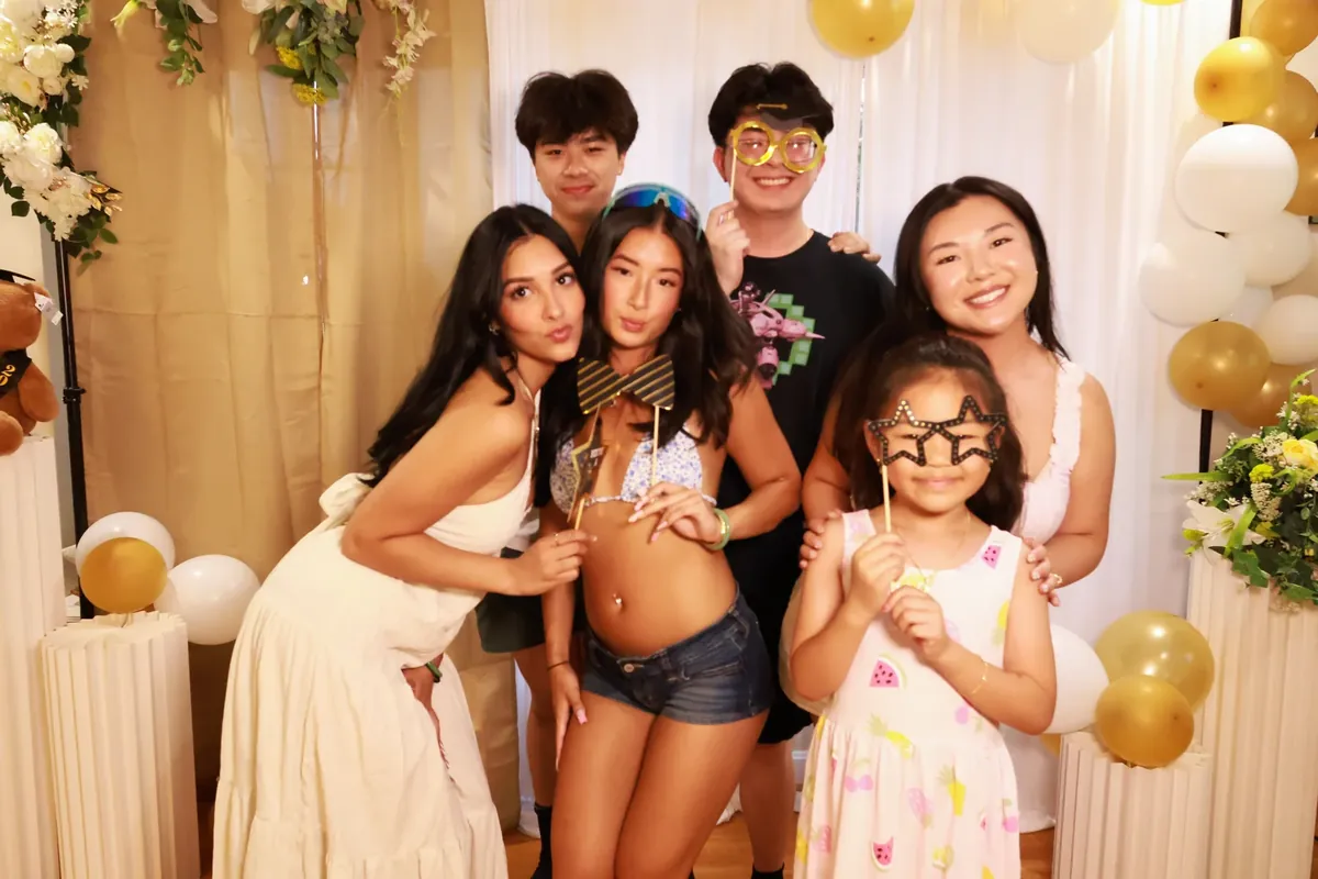 Family at a gold and white celebration