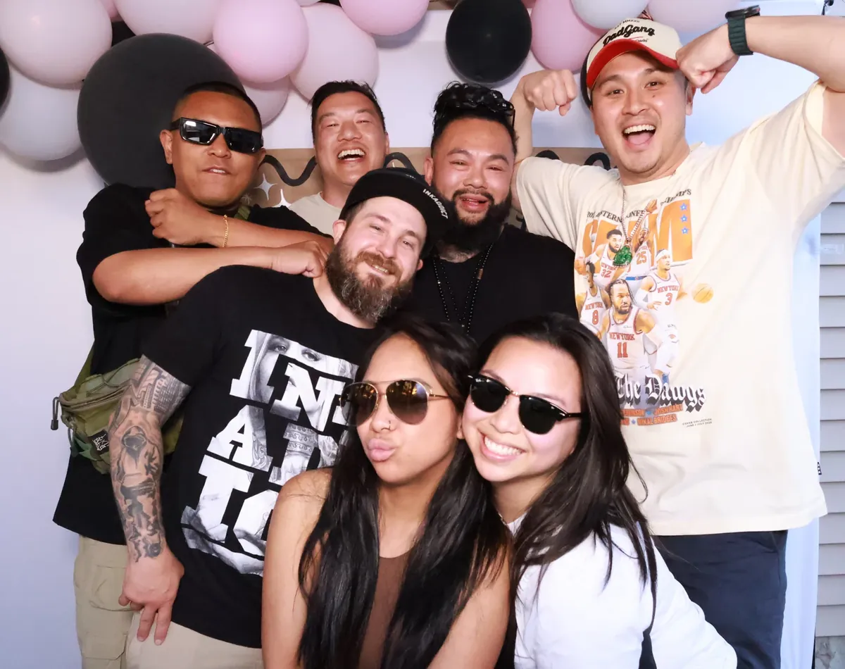 Guests with sunglasses and photo booth props